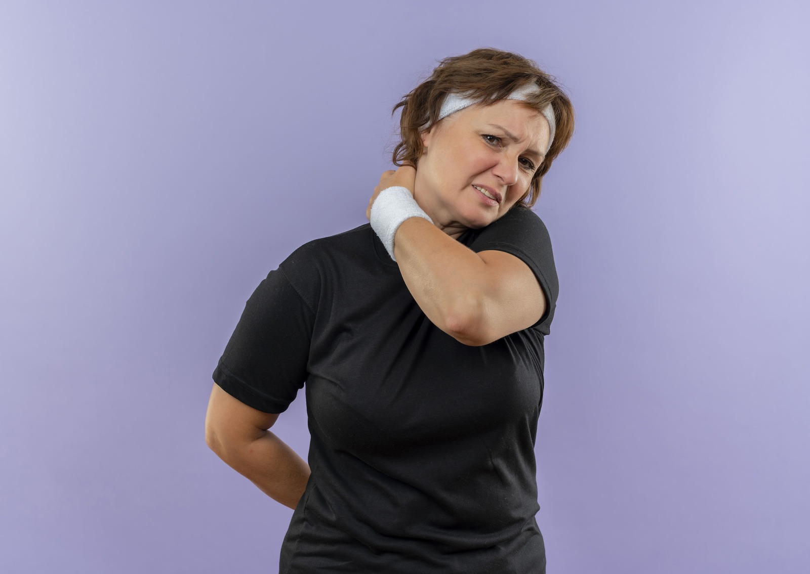 Mujer con dolor muscular